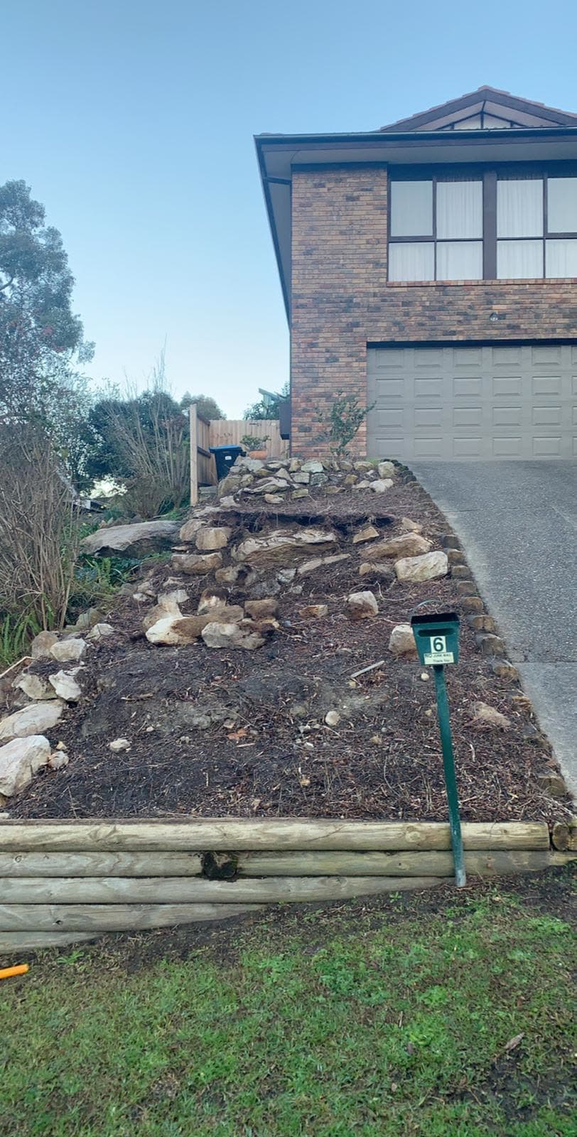 Davidson garden clearing with vegetation reduced around a residential property